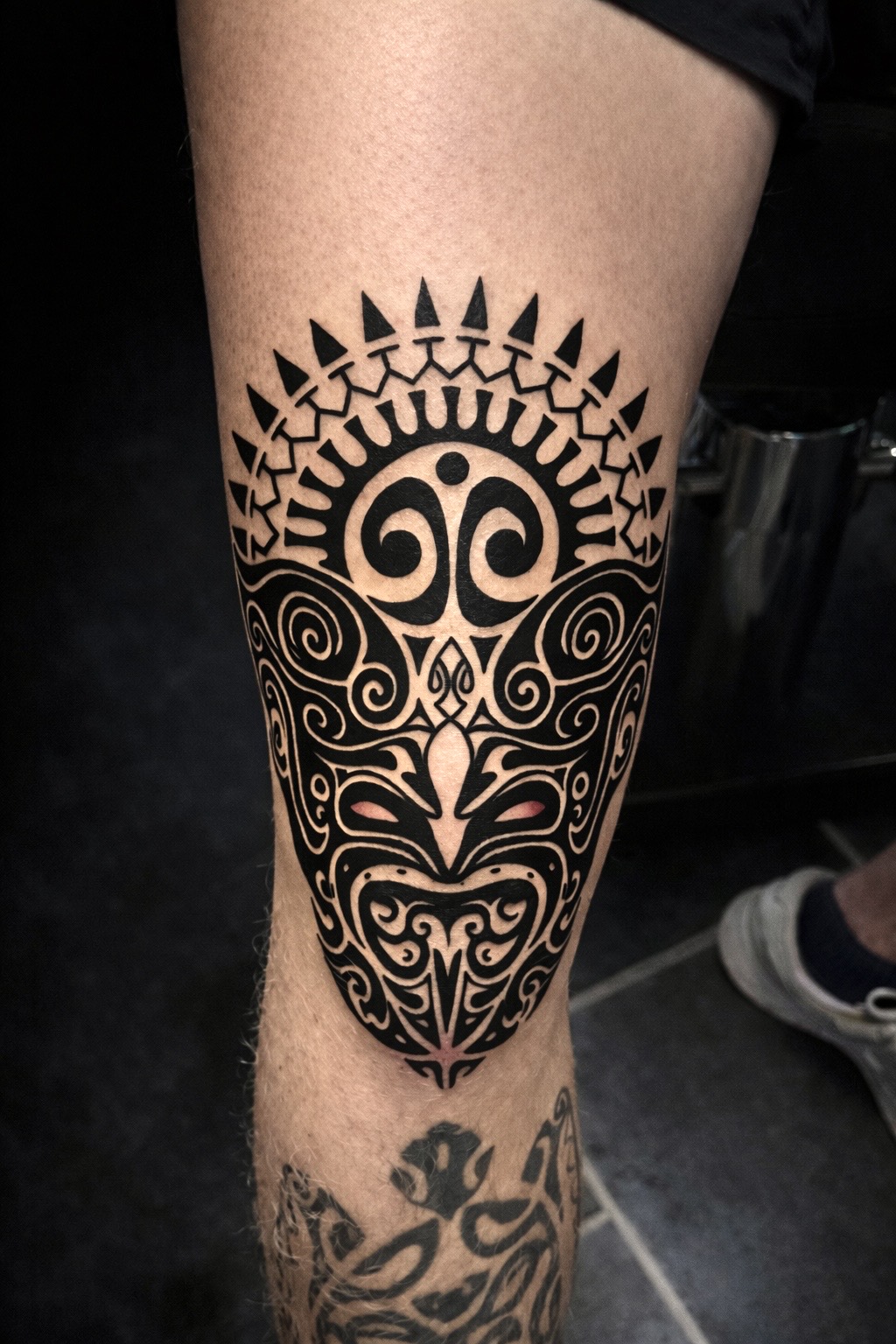Maori-Tattoo am Bein